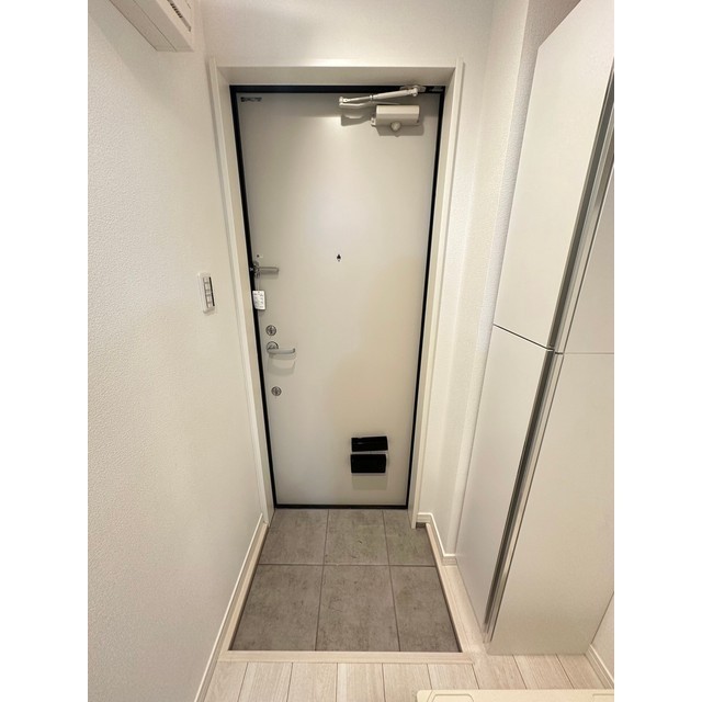 エクセラン西尾久East101号室 玄関