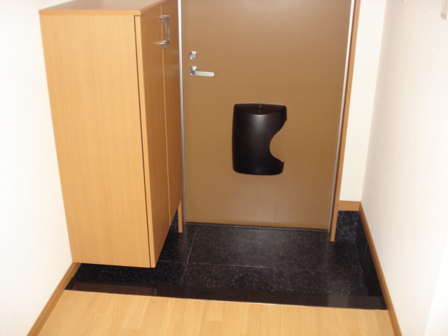 ドミール・ソレイユ101号室 玄関