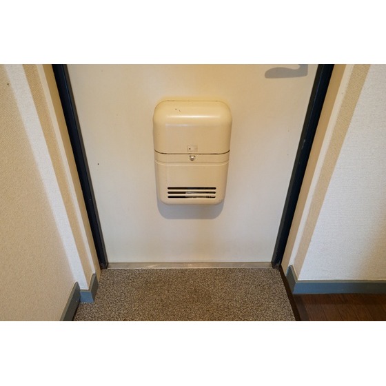 ドウェル砂川0201号室 ドアポスト