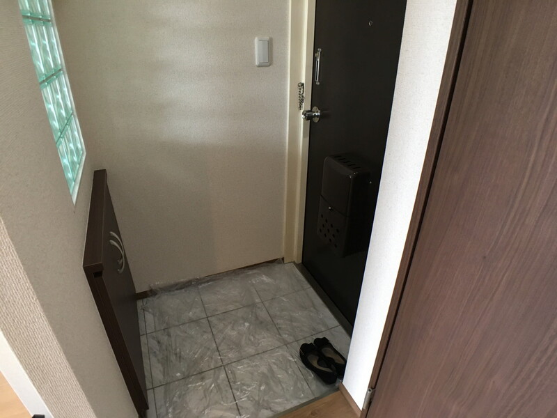 クリオネコート新城 玄関