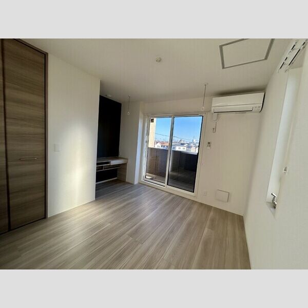 メゾンドール・カムイδ館303号室 洋室