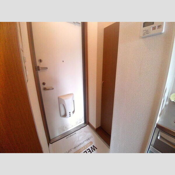 メルヴェーユ橋本 シュ―ズボックスがある玄関