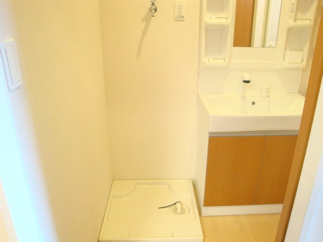 ライジング・サン102号室 室内洗濯機置場