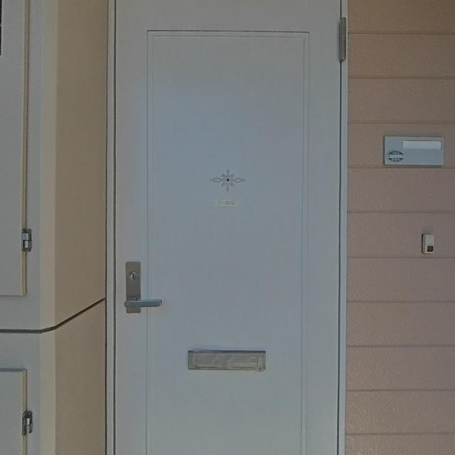 ウインズウメサト2階 玄関