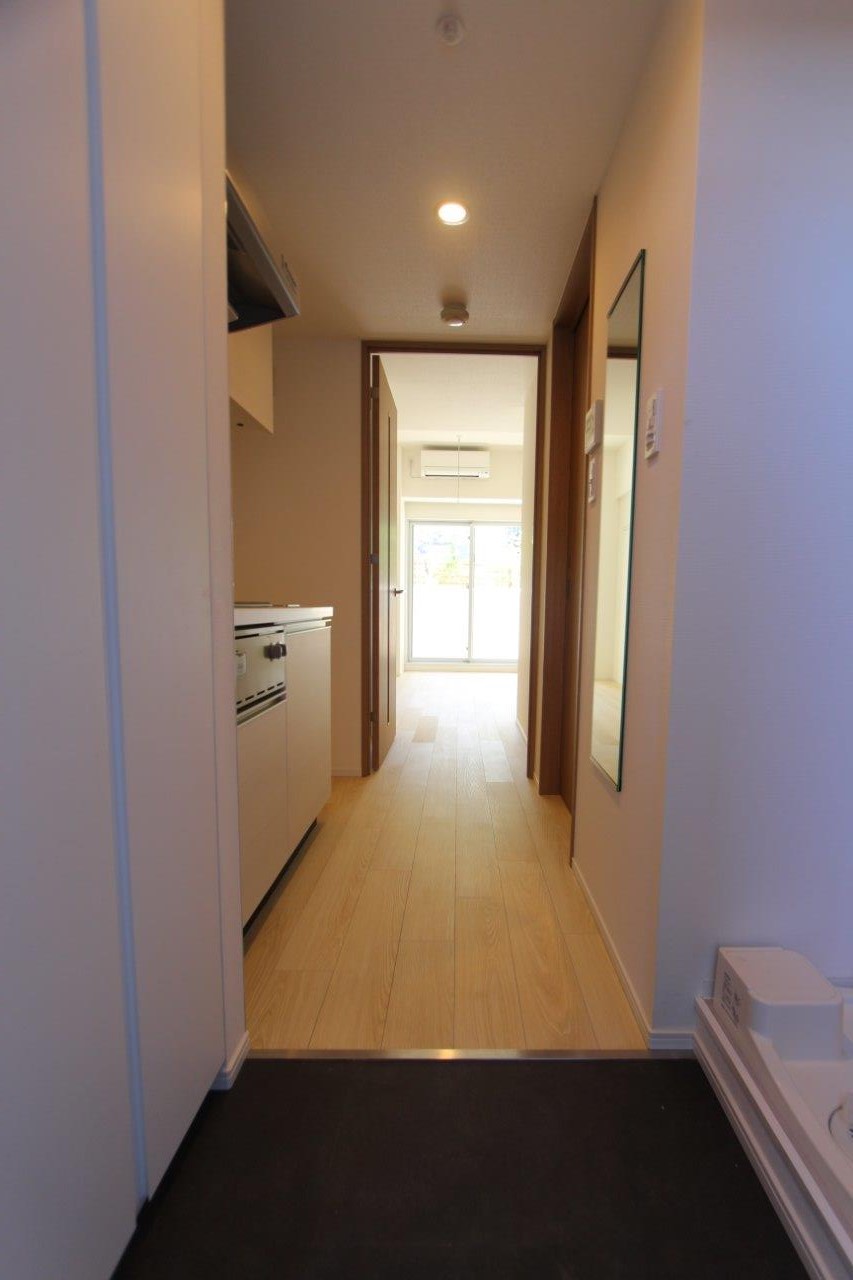 プラウドフラット登戸 玄関