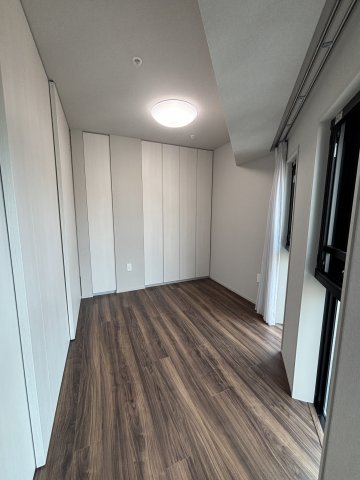 クリオ市谷薬王寺1101号室 リビング隣洋室