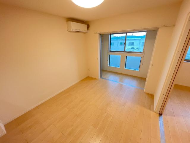 ハーモニーヒルズ202号室 リビング