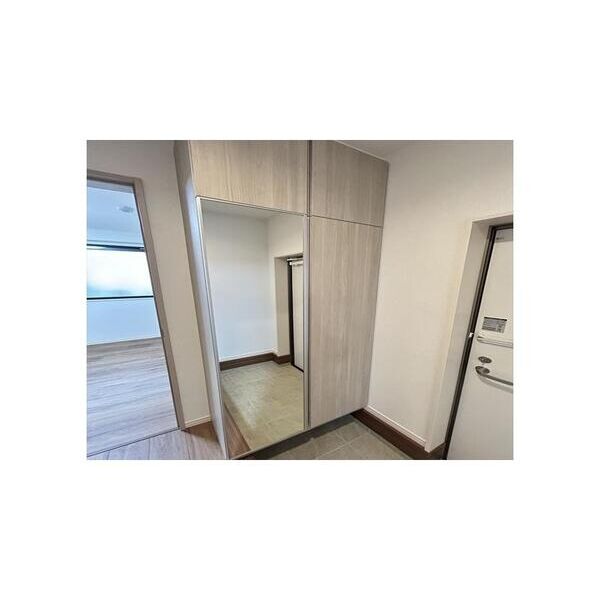 サンセット柏たなか 玄関