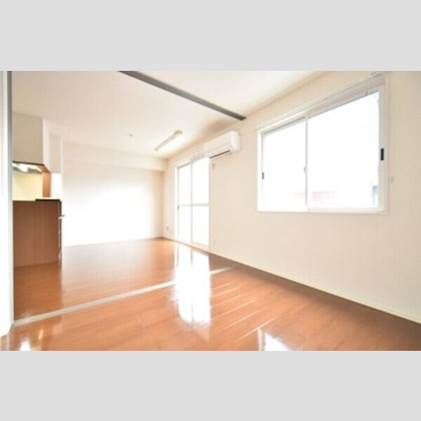 エスポワール文京103号室 居室とリビングダイニング