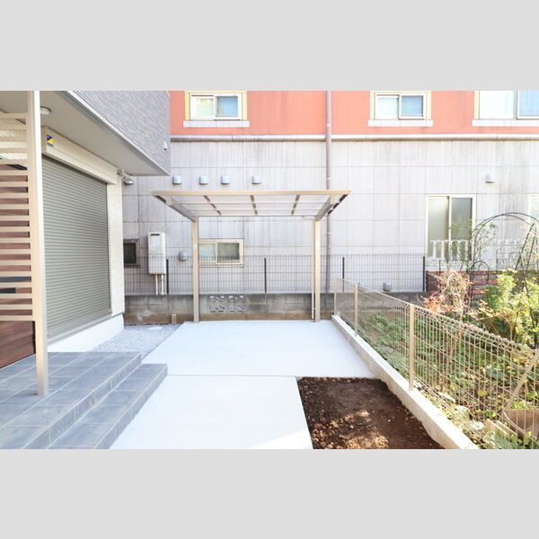 ボヌールK103号室 駐輪場