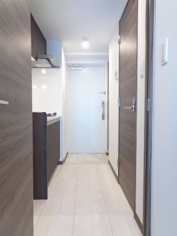 ジェノヴィア中野島115号室 玄関