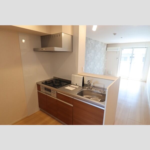 アゼリア松戸205号室 システムキッチン　三口コンロ