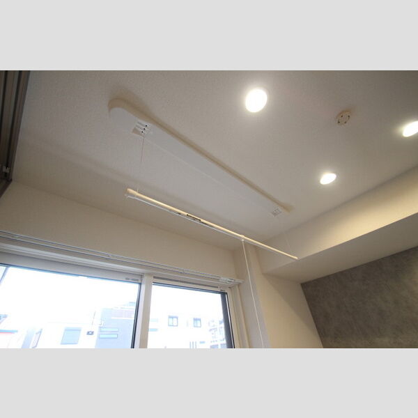 D-paina港南105号室 室内物干し