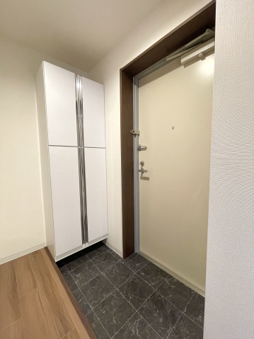 スカイラシクラス平和台101号室 玄関