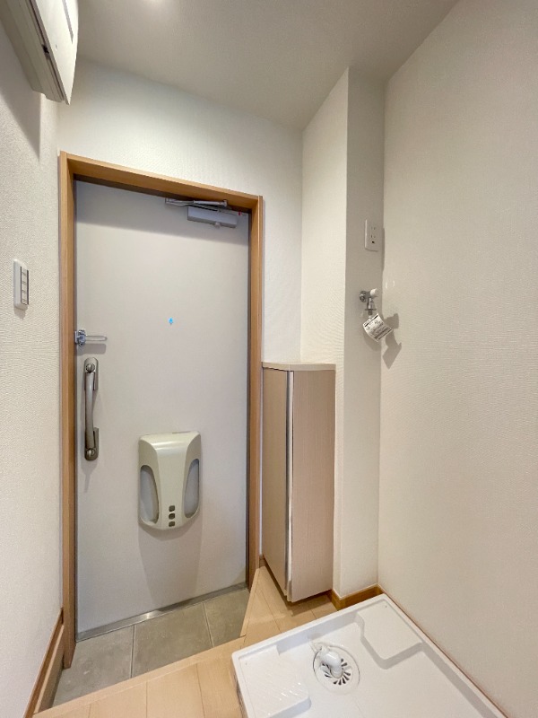 ラクシュミーKikuna1階 玄関