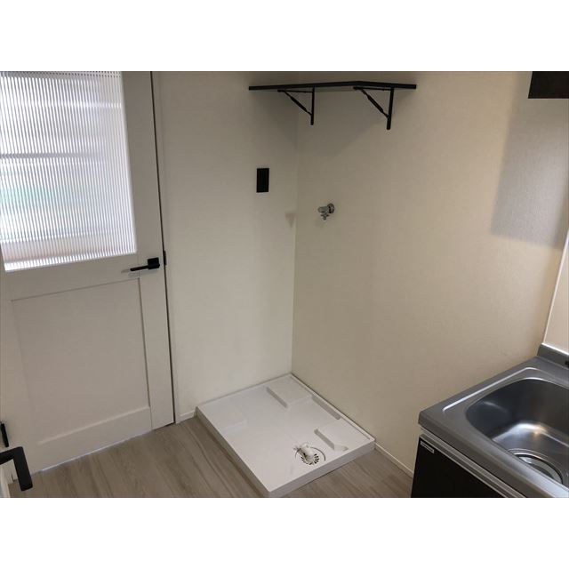 サザングラス202号室 室内洗濯機置場