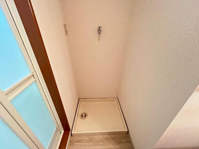 ガーデンヒルズNAKAYAMA壱番館208号室 洗濯機置場