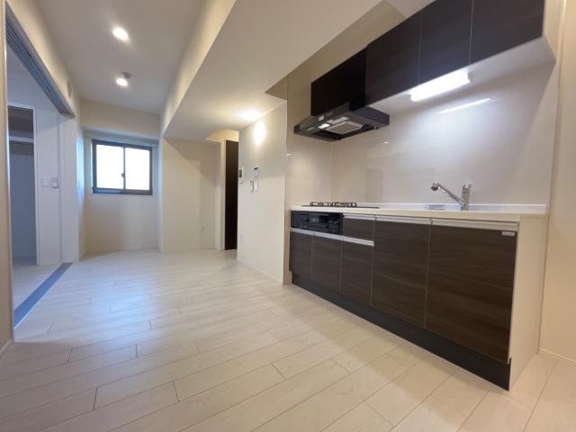 エムヒルズ（Ｍ・ＨＩＬＬＳ）603号室 リビング