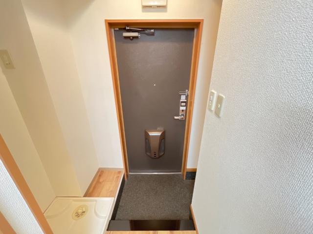 サンモールＳ，Ｔ105号室 玄関