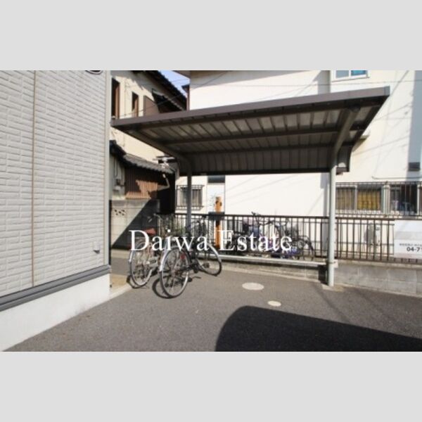 ノーブル富里202号室 駐輪場