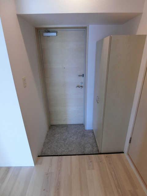 キャピタルノア日野 玄関