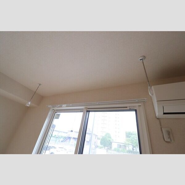 キャリコマルモ102号室 室内物干し