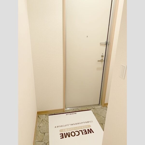 アヴェニール志津　B201号室 玄関入口