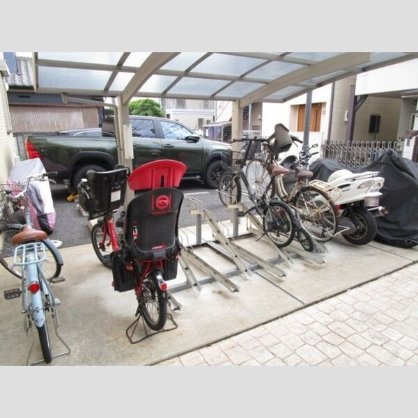 ミ・カーサ102号室 駐輪場