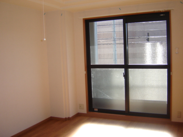 グランモンターニャ103号室 洋室