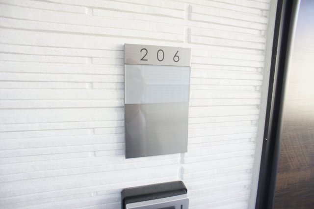 クオーレ田喜野井0206号室 玄関