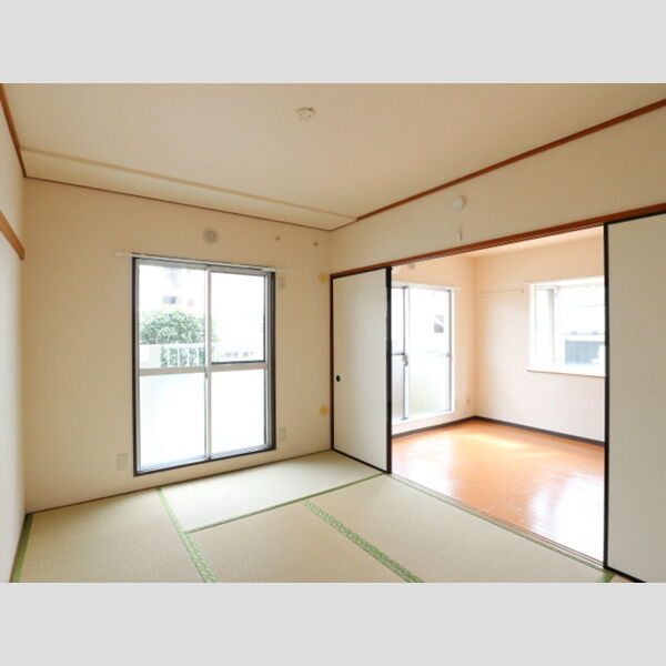 第二パールメゾン染谷108号室 和室から洋室