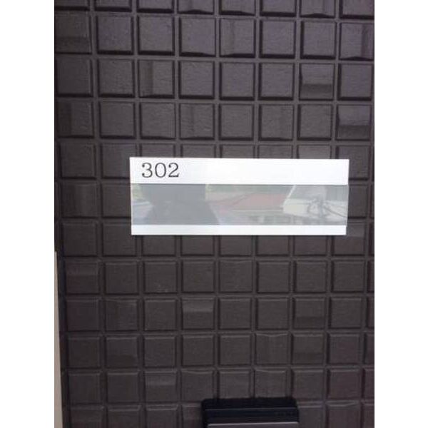 クレセント中野 玄関