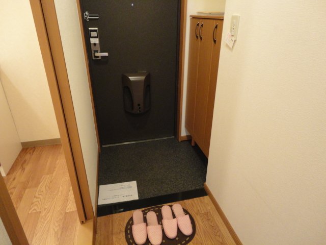 ガーデンヒルズNAKAYAMA壱番館106号室 玄関