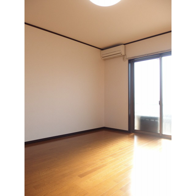 アムール 星の宮207号室 リビング