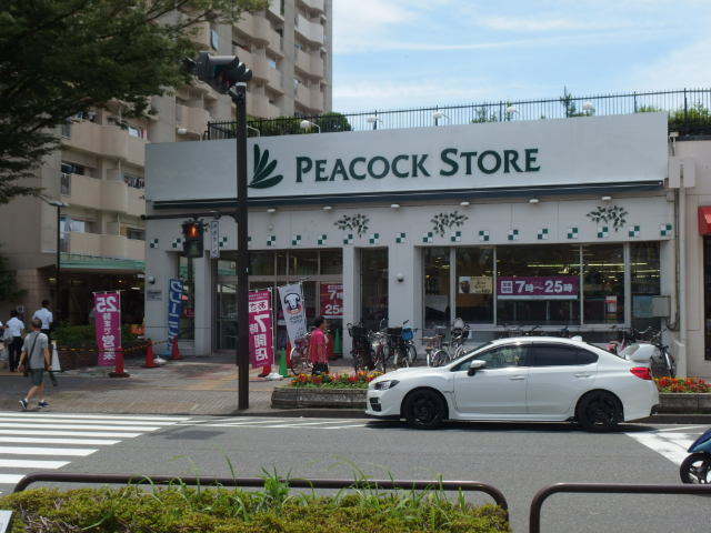 リリー本郷台５号棟0204号室 【デパート】ピーコックストア本郷台店まで550ｍ