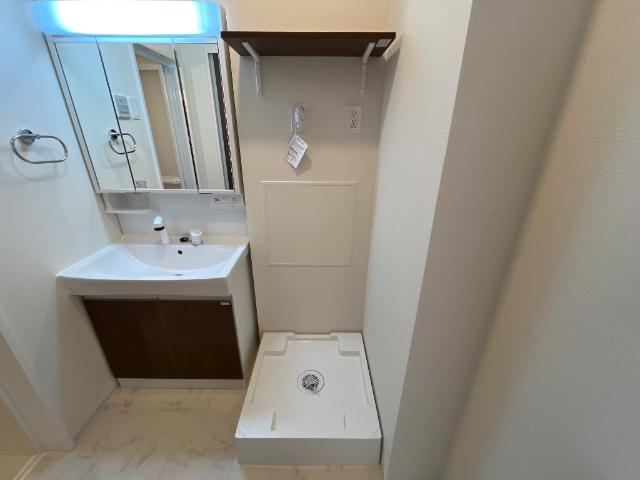 （仮称）柏市篠籠田　新築アパート203号室 洗濯機置場（イメージ）