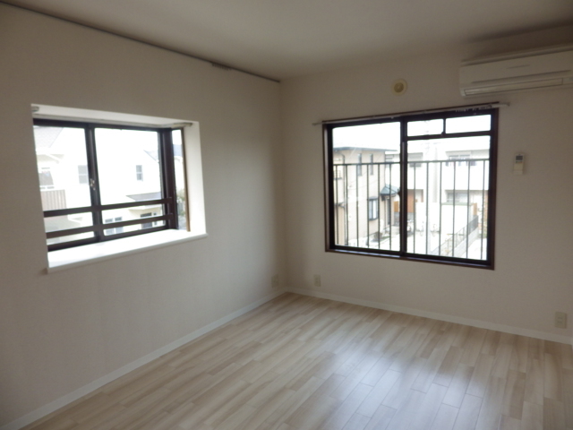 リヴェール高幡２　Ａ棟A205号室 リビング