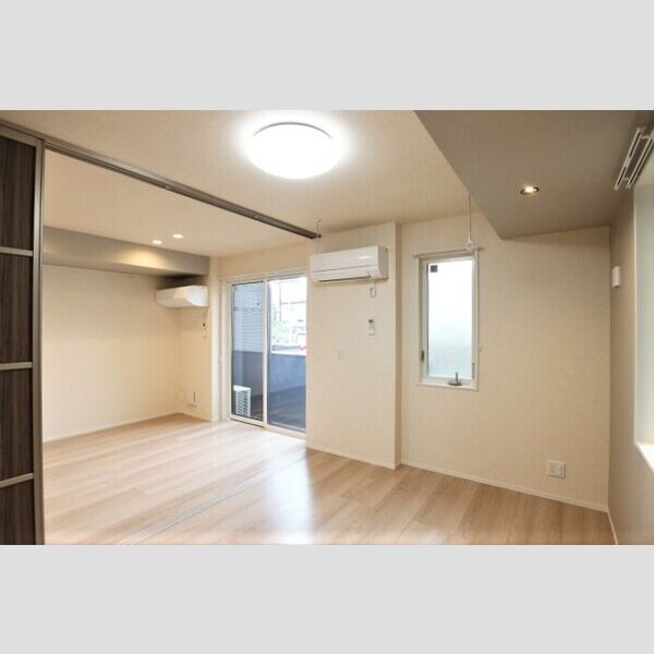 デュランタ103号室 洋室からリビング