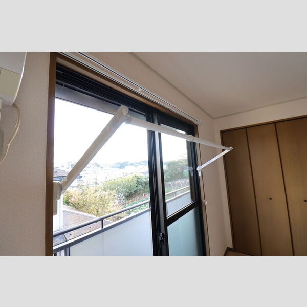 グリーンコーポラス202号室 室内物干