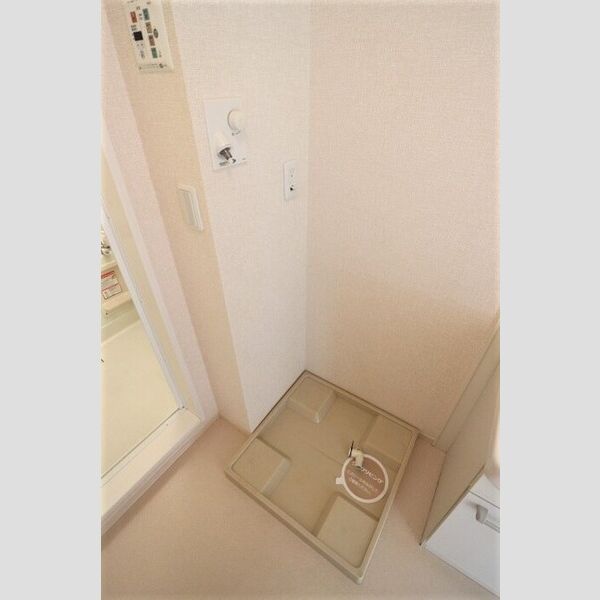 トレグラース　A棟205号室 室内洗濯機置場