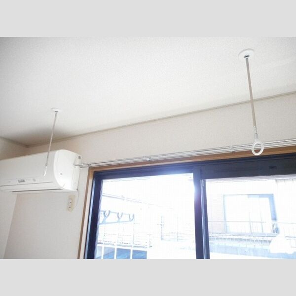 サニーコート久保田203号室 室内物干し