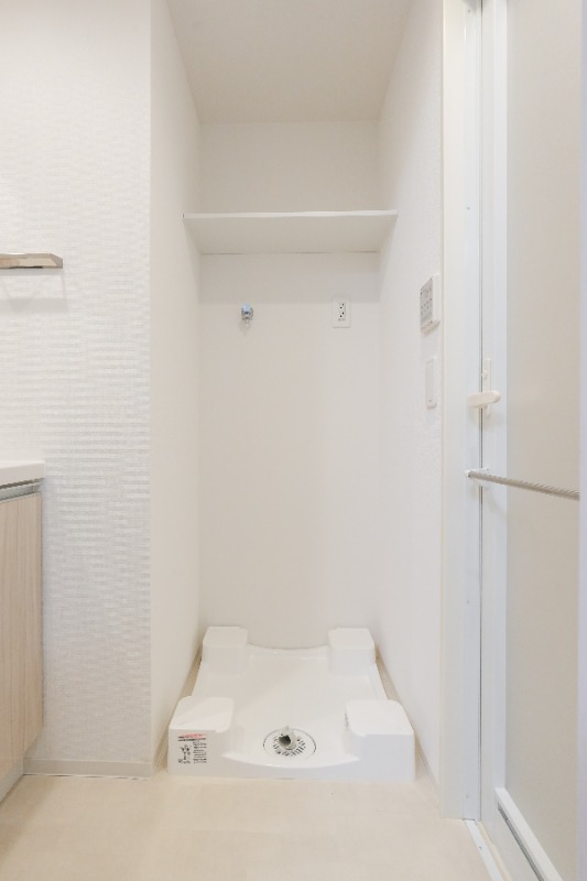 ドゥーエ日暮里Ⅲ1階 洗濯機置場