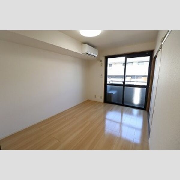 トリニシティ　弐番館202号室 洋室