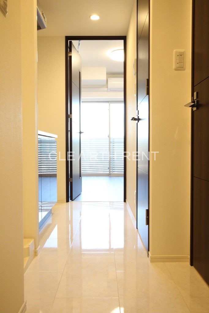 コンシェリア大崎 ＣＲＯＳＳＩＡ15階 大理石調フローリング貼りの玄関廊下