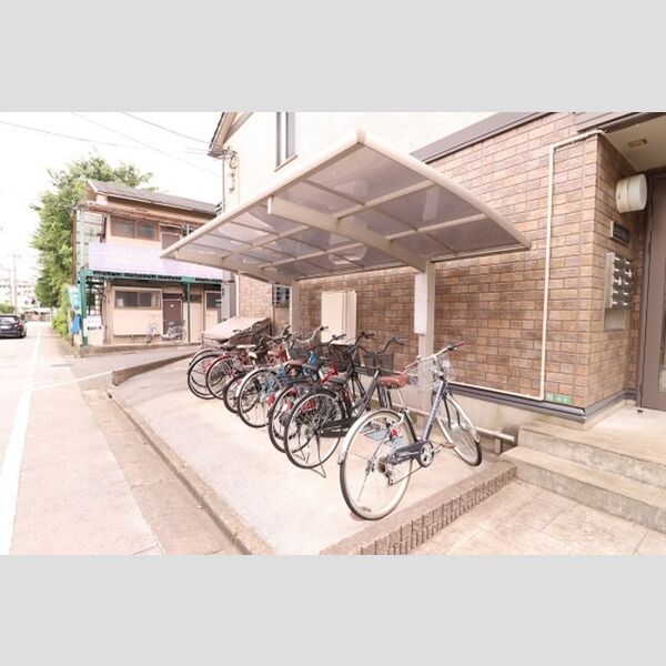 モナリエ平和台　ⅠⅡⅢⅡ203号室 屋根付き自転車駐輪場
