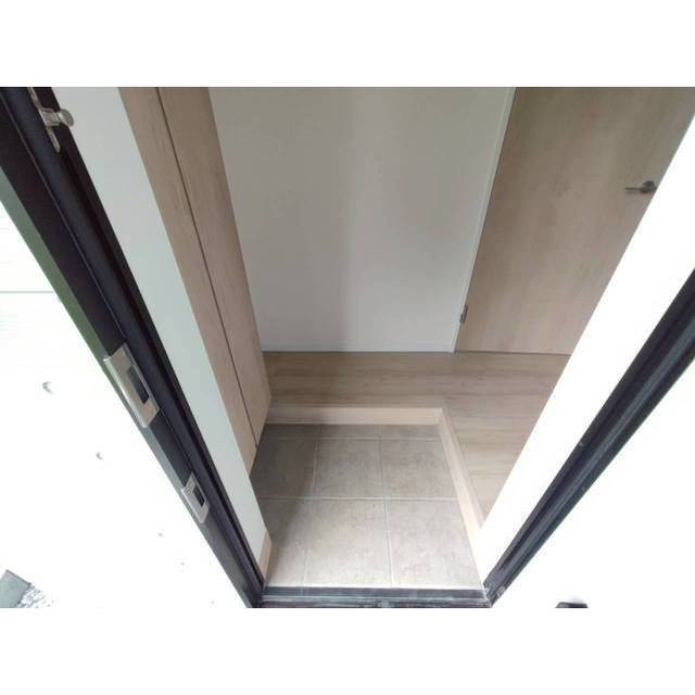 エクセラン柴崎町104号室 玄関