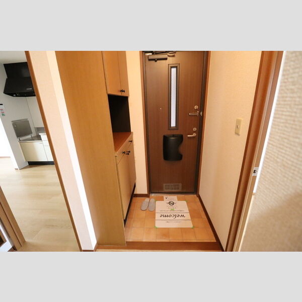 ロイヤルクレッセント西登戸 玄関