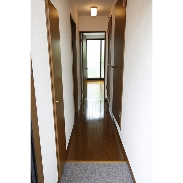 プレジール R 玄関