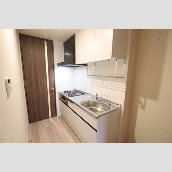 STELLA新松戸203号室 キッチン　三口コンロ